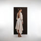 IVORY OPEN-BACK DRAPE DRESS