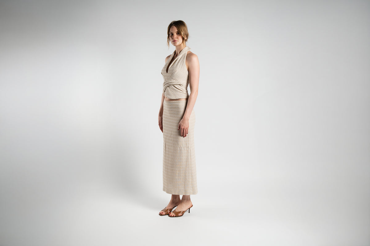 ALISADUDAJ beige linen halter top and maxi skirt set, front three-quarter view showing collared halter neckline