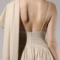 ALISADUDAJ beige linen and viscose one-shoulder draped dress, back close-up of open back, strap and zip