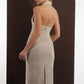 ALISADUDAJ beige wool halterneck column dress, back three-quarter view showing open back and centre slit