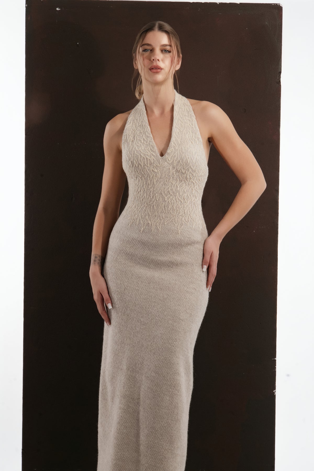 ALISADUDAJ beige wool halterneck column dress, front view showing halter collar and fitted waist