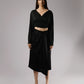 ALISADUDAJ black linen deep-V wrap top and midi skirt set, front view, full length, showing batwing sleeves and asymmetric wrap hem