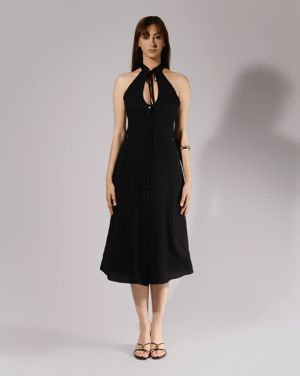 ALISADUDAJ black linen halter cut-out dress, front view, full length, showing tie-neck keyhole and button-down front