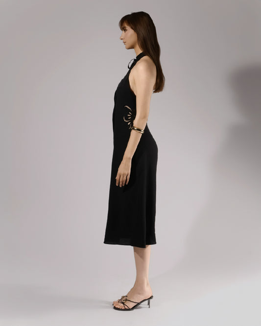 ALISADUDAJ black linen halter cut-out dress, side profile showing floral embroidered cut-out at the waist