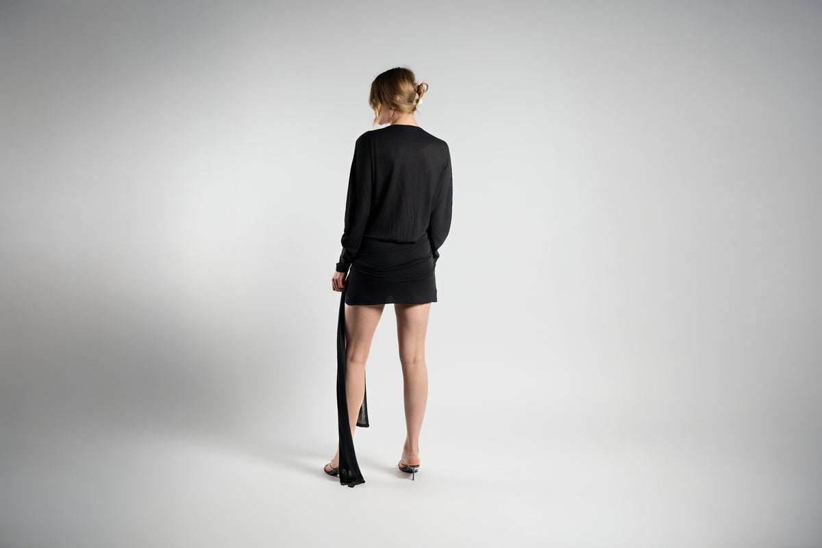 ALISADUDAJ black linen plunge-neck mini dress, back view showing draped back and trailing sash