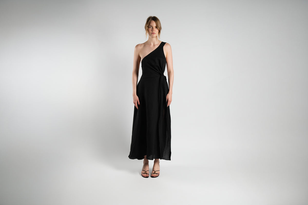 ALISADUDAJ black linen-silk one-shoulder dress, front view, full length, showing knotted waist tie