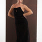 ALISADUDAJ black and red pinstripe wool maxi dress, three-quarter view with hand behind back showing fitted hip