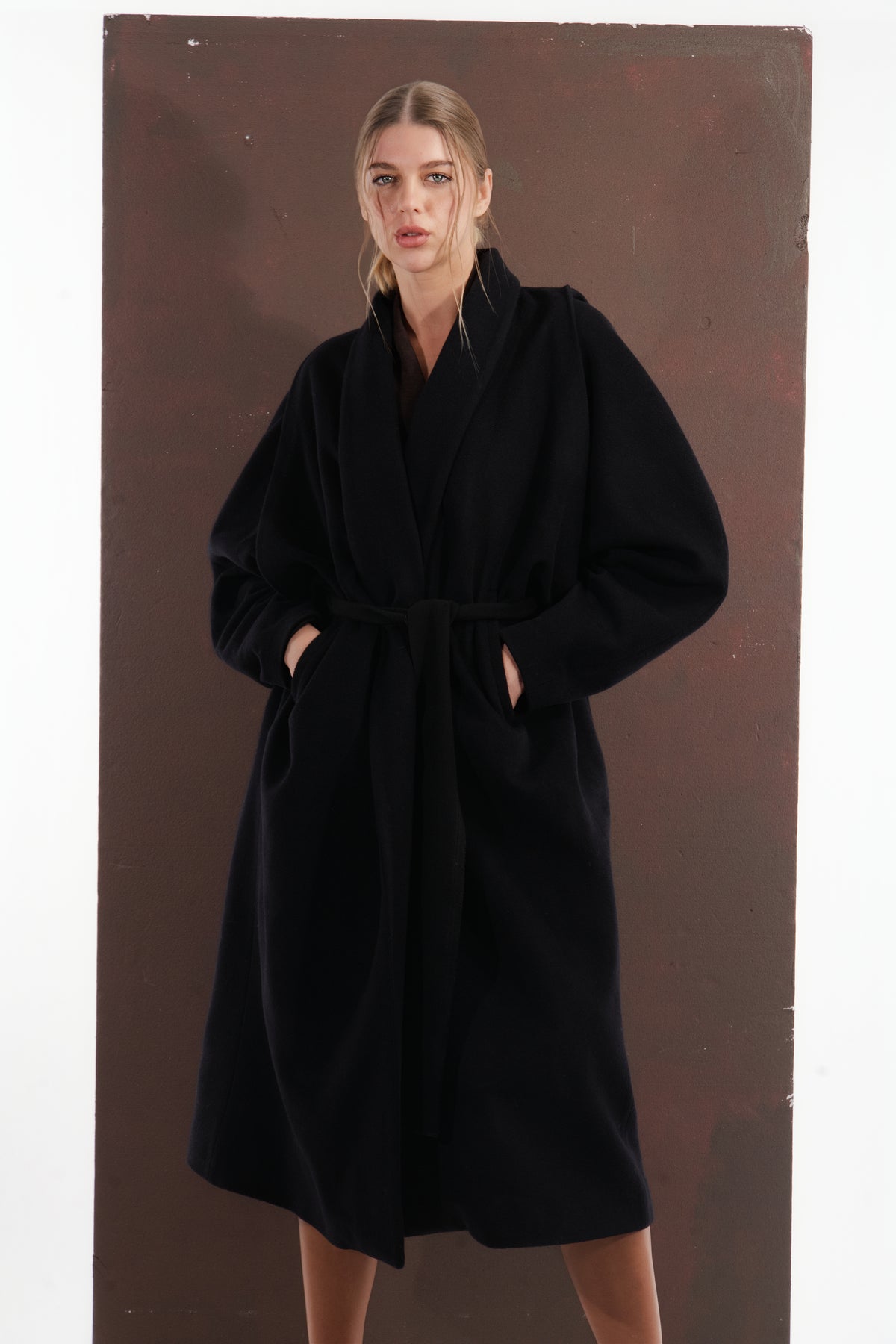 ALISADUDAJ black wool belted wrap coat, half-length front view showing shawl collar, belt and pockets, wool blend