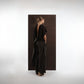 ALISADUDAJ black wool draped cowl top and trouser set, back view showing open back and trailing drape