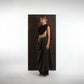 ALISADUDAJ black wool draped cowl top and trouser set, side three-quarter view showing draped hip panel