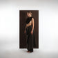 ALISADUDAJ black wool draped cowl top and trouser set, side profile showing cowl drape and wide-leg trousers