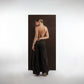 ALISADUDAJ black wool draped wide-leg trousers, back view showing high waistband and wide leg