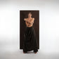 ALISADUDAJ black wool draped wide-leg trousers, front view showing button waistband and deep fabric folds
