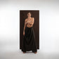 ALISADUDAJ black wool draped wide-leg trousers, front view showing full drape falling to the floor