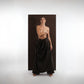 ALISADUDAJ black wool draped wide-leg trousers, front view styled without the top, showing waistband and draped overlay