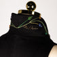 ALISADUDAJ black wool hand-embroidered wrap dress, close-up of stand collar with embroidered vines and beading