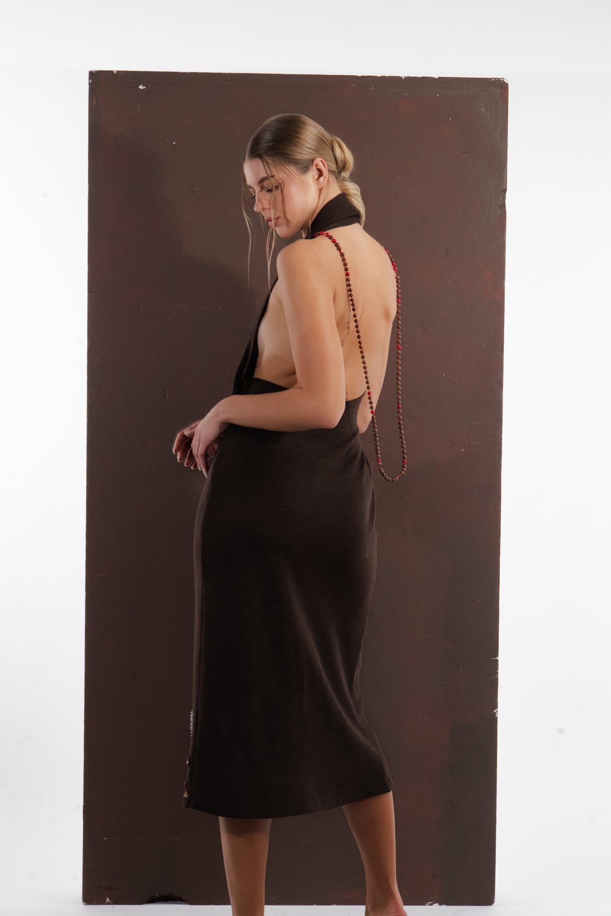 ALISADUDAJ brown wool garden-embroidered wrap dress, back view showing open back and halter neck