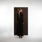 ALISADUDAJ brown wool open-back maxi dress, back view showing deep open back with draped shawl