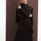 ALISADUDAJ brown wool open-back maxi dress, front view with shawl and arms crossed