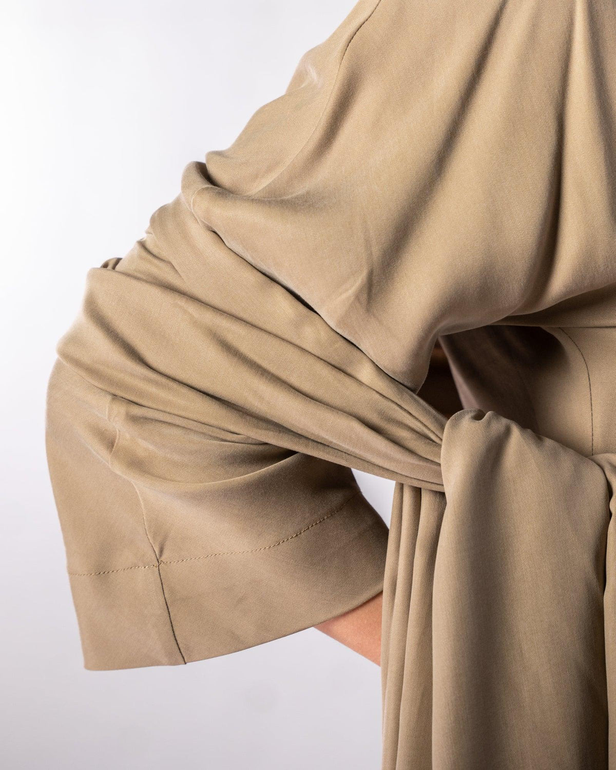 ALISADUDAJ CRAFT 02 brown cupro draped shirt dress, side close-up of knotted sash drape at the waist