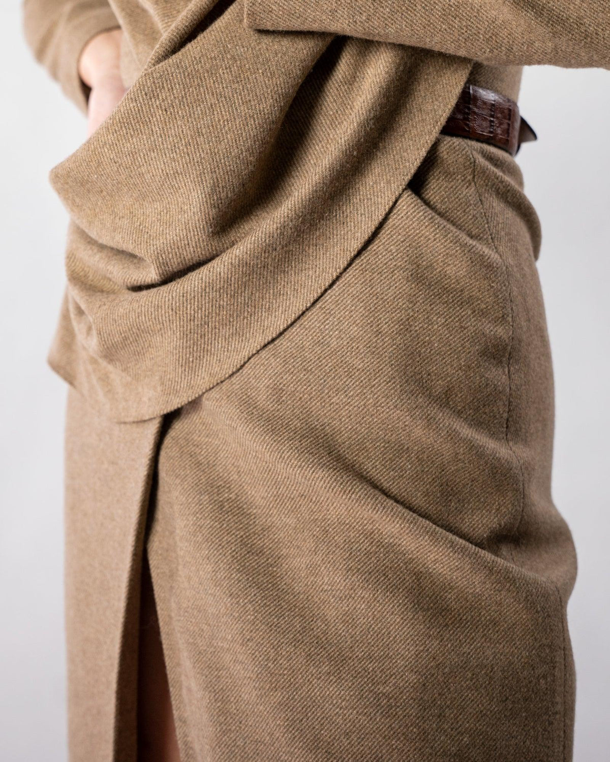 ALISADUDAJ CRAFT 04 brown wool set, close-up of draped jacket hem over the wrap midi skirt