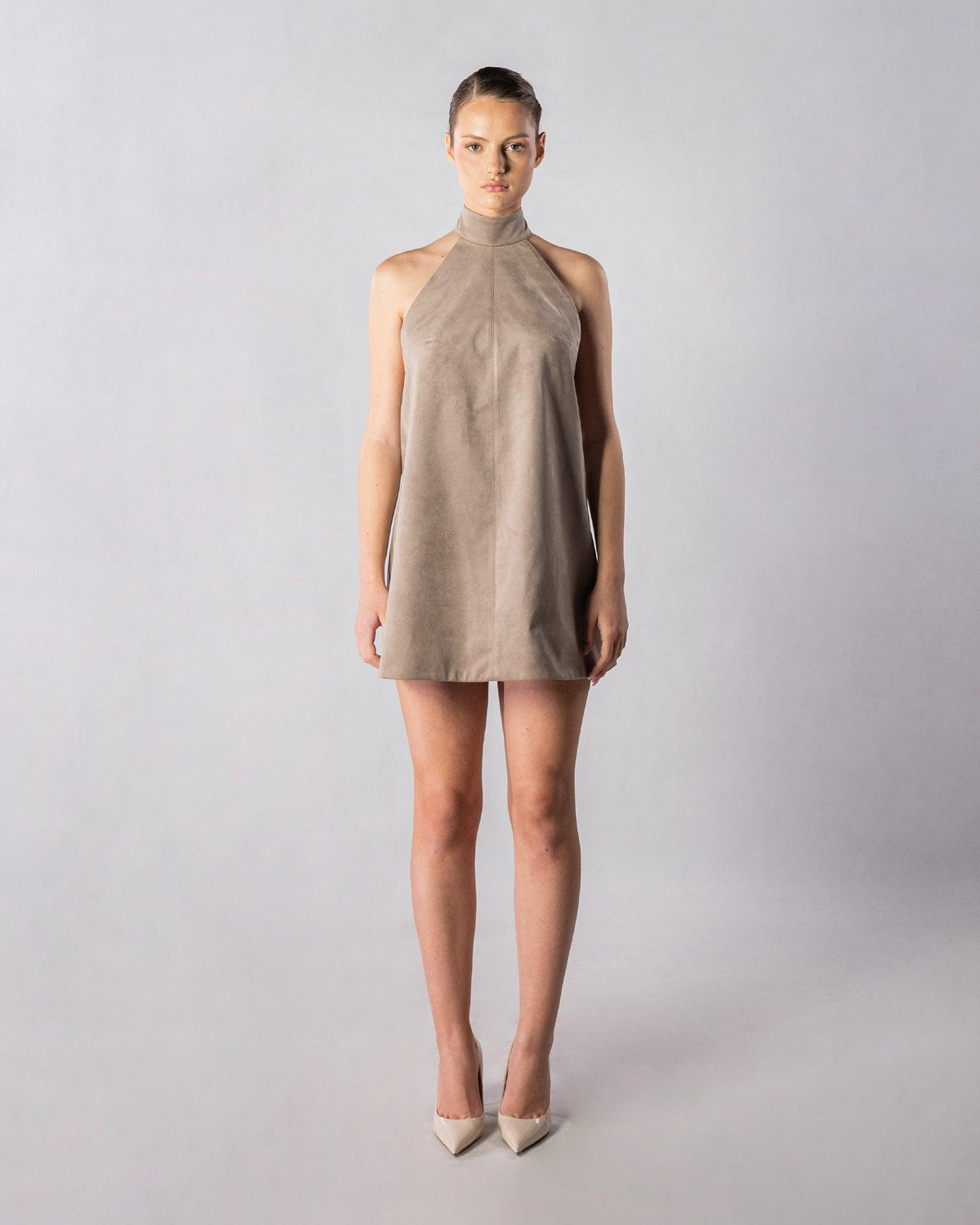 ALISADUDAJ CRAFT 06 grey faux-suede halter mini dress, front view, full length, showing high funnel collar and A-line shape