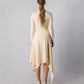 ALISADUDAJ CRAFT 07 off-white wool turtleneck and wrap skirt set, back view showing pointed handkerchief hem, wool