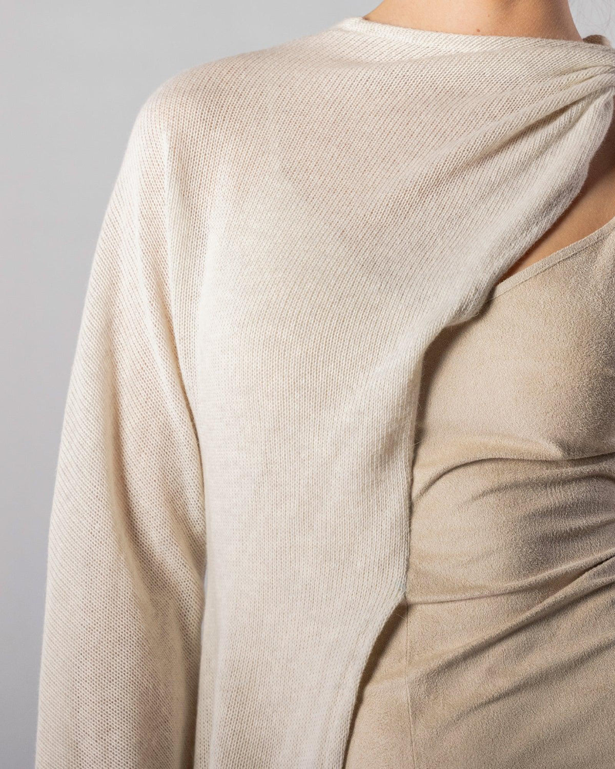 ALISADUDAJ CRAFT 09 off-white layered dress, close-up of draped knit overlay across the shoulder and suede bodice