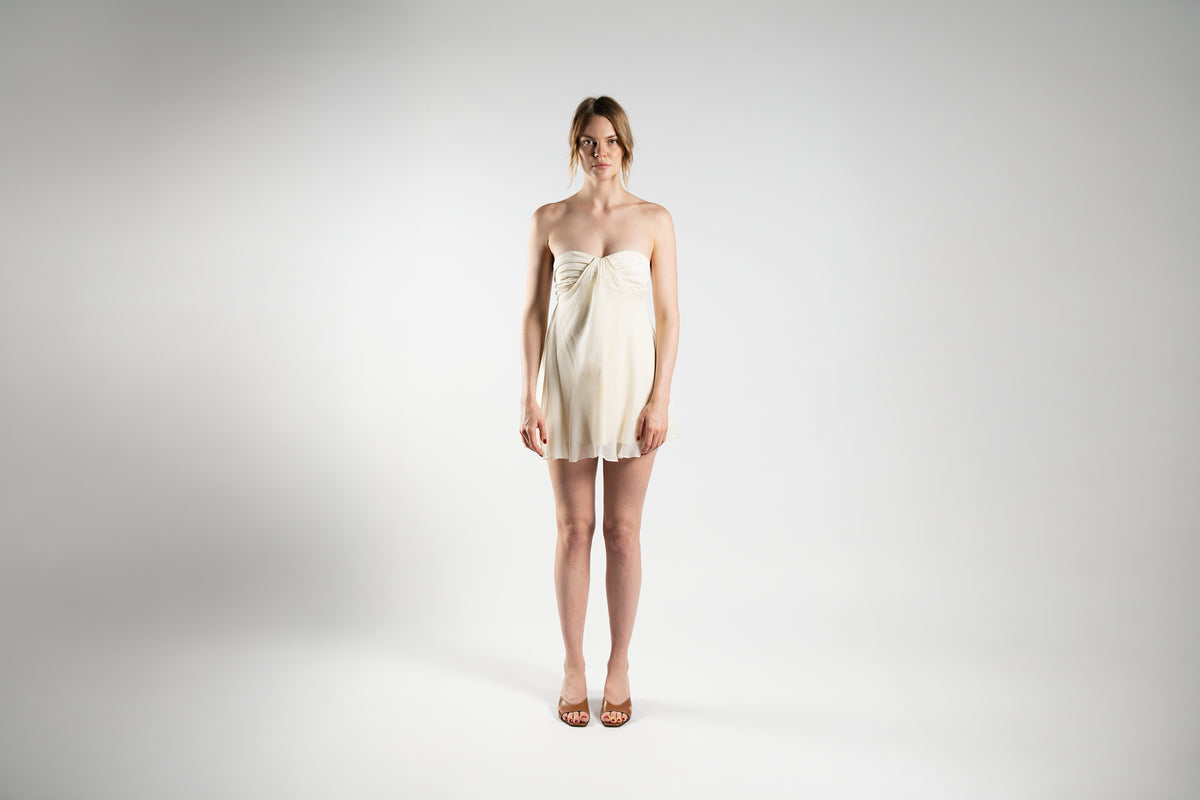 ALISADUDAJ cream linen and silk strapless mini dress, front view, full length, showing ruched bust and floaty skirt