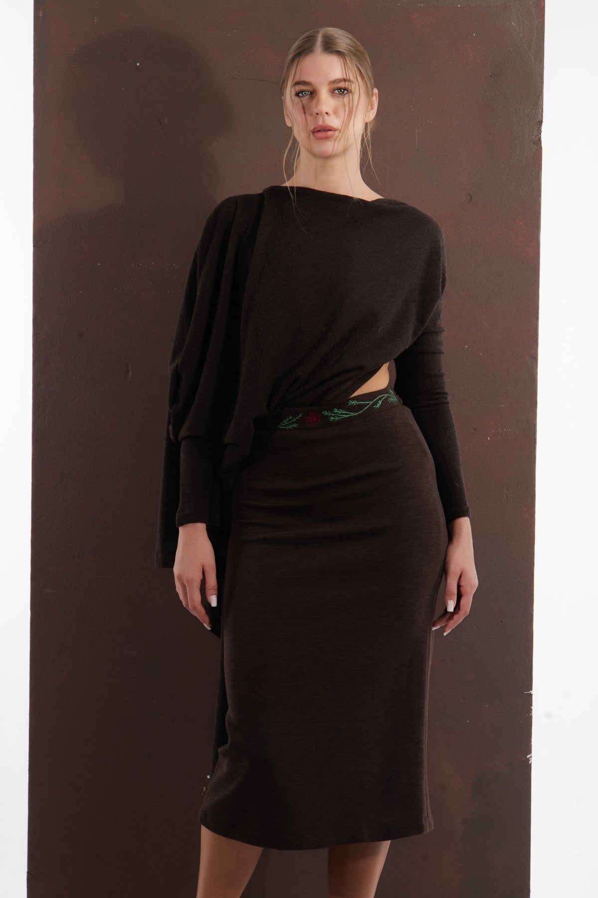 ALISADUDAJ dark brown wool draped set, front view showing blouson sleeves and embroidered waistband