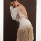 ALISADUDAJ ivory wool fringed dress, back view leaning forward showing open back and fitted hip