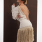 ALISADUDAJ ivory wool fringed dress, back three-quarter view showing open back and braid-trimmed edge