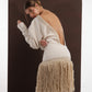 ALISADUDAJ ivory wool fringed dress, side back view showing fitted skirt and beige fringe tiers