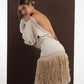 ALISADUDAJ ivory wool fringed dress, back three-quarter view showing braid trim along the open back