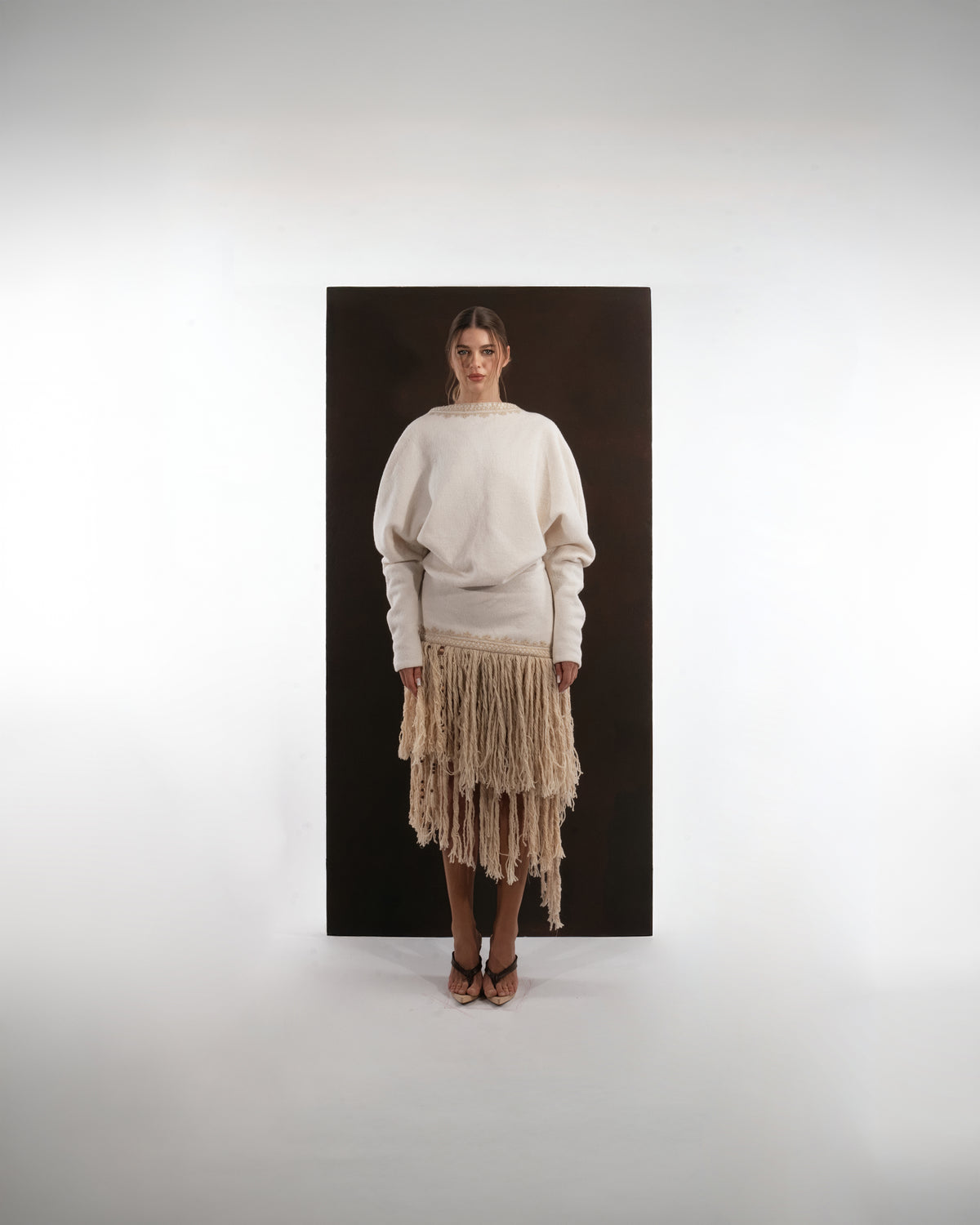 ALISADUDAJ ivory and beige wool fringed dress, front view, full length, showing blouson sleeves and tiered fringe skirt