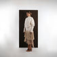 ALISADUDAJ ivory wool fringed dress, side three-quarter view showing blouson bodice and fringe layers