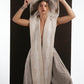 ALISADUDAJ ivory wool beaded hooded vest, close-up of hood edge and hanging wooden beaded cords