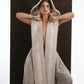 ALISADUDAJ ivory wool beaded hooded vest, front close-up of open-front jacquard border and beaded cords, wool blend