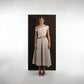 ALISADUDAJ ivory and grey wool red-embroidered dress, front view showing off-shoulder neckline and full midi skirt