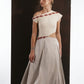 ALISADUDAJ ivory and grey wool red-embroidered dress, three-quarter view showing off-shoulder cap sleeve
