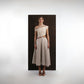 ALISADUDAJ ivory and grey wool dress with red embroidery, front view, full length, showing asymmetric neckline and waist cut-out