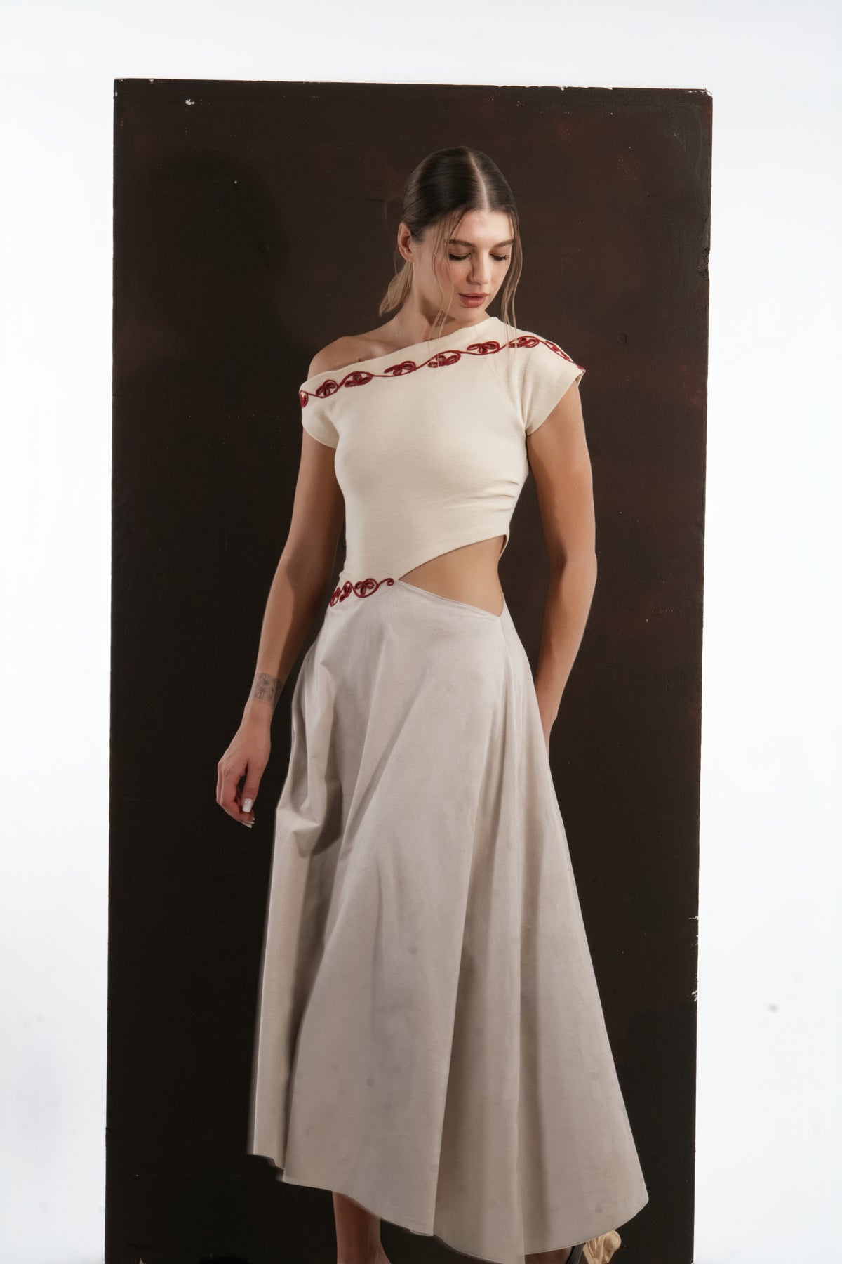 ALISADUDAJ ivory and grey wool red-embroidered dress, half-length view showing cut-out and embroidered waistline
