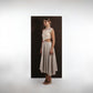 ALISADUDAJ ivory and grey wool red-embroidered dress, side view showing red scroll embroidery at neckline and waist