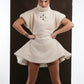 ALISADUDAJ ivory ribbed wool flared mini dress, front view with hands at the waist showing fitted bodice
