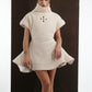 ALISADUDAJ ivory ribbed wool flared mini dress, three-quarter view showing cut-out detail at the chest