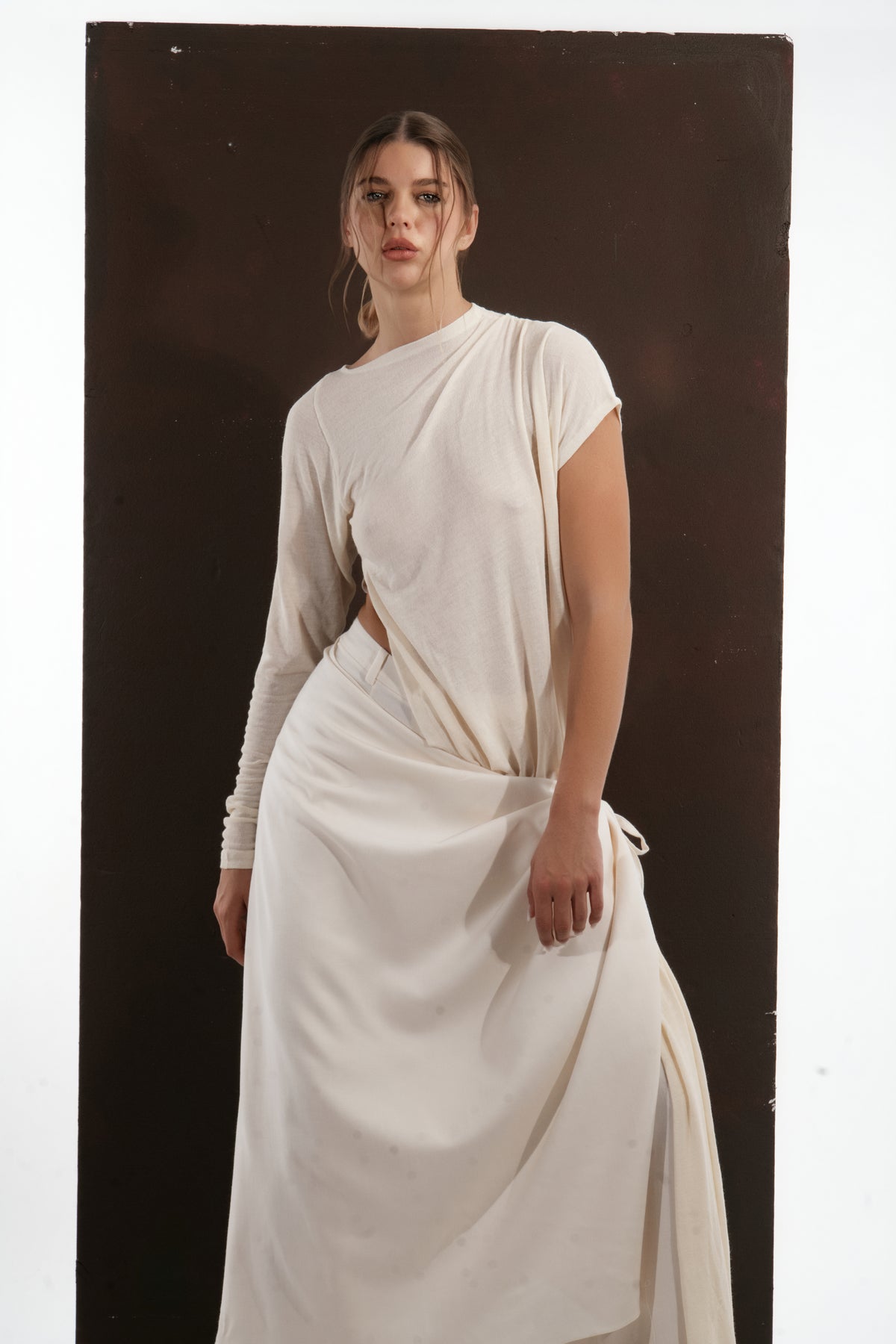 ALISADUDAJ ivory wool draped asymmetric set, half-length three-quarter view showing cap sleeve and drape