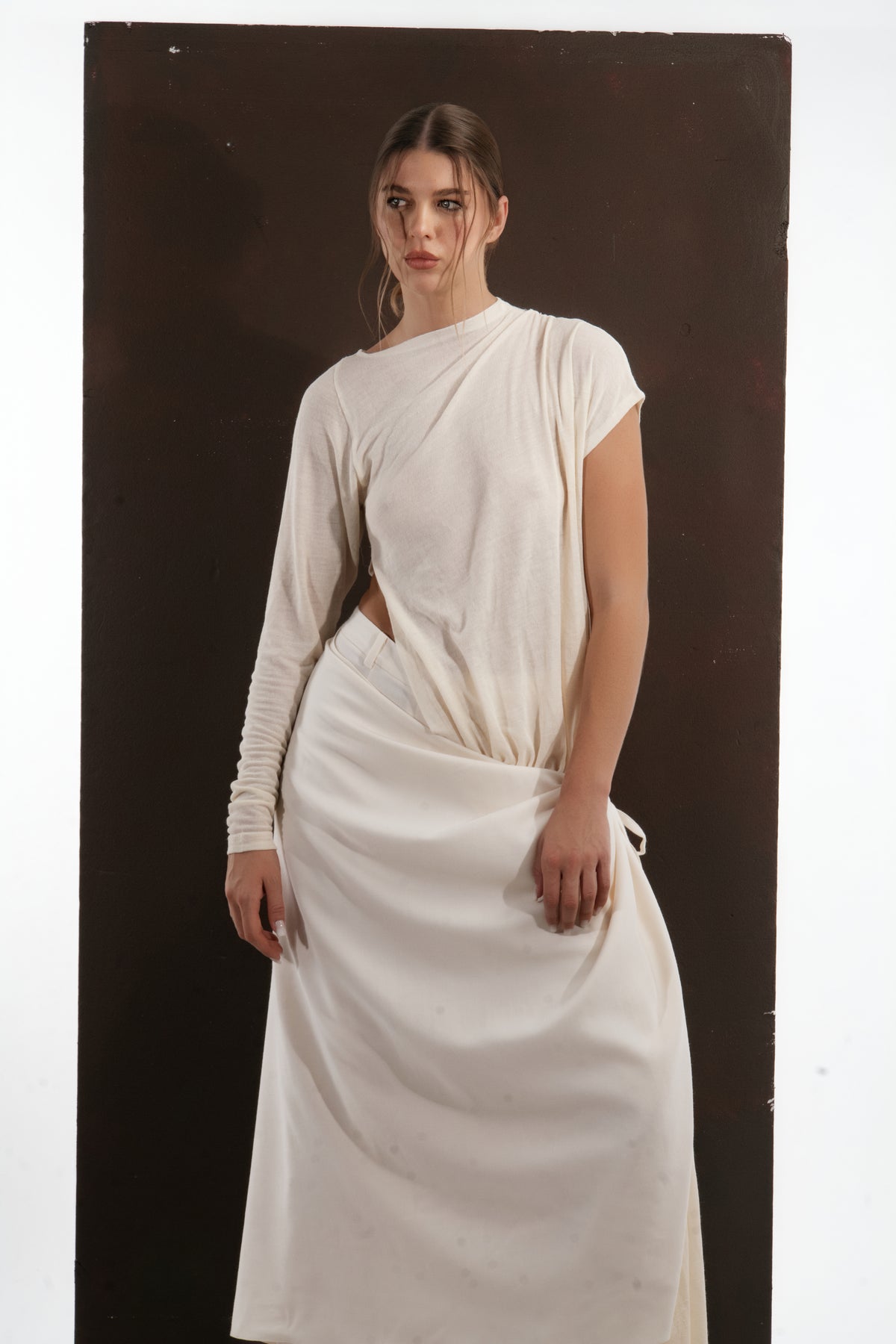 ALISADUDAJ ivory wool draped asymmetric set, half-length front view showing ruched sleeve and draped bodice