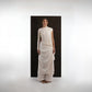 ALISADUDAJ ivory wool asymmetric draped top and wrap skirt set, front view, full length, over wide-leg trousers