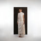 ALISADUDAJ ivory wool draped asymmetric set, side three-quarter view, full length