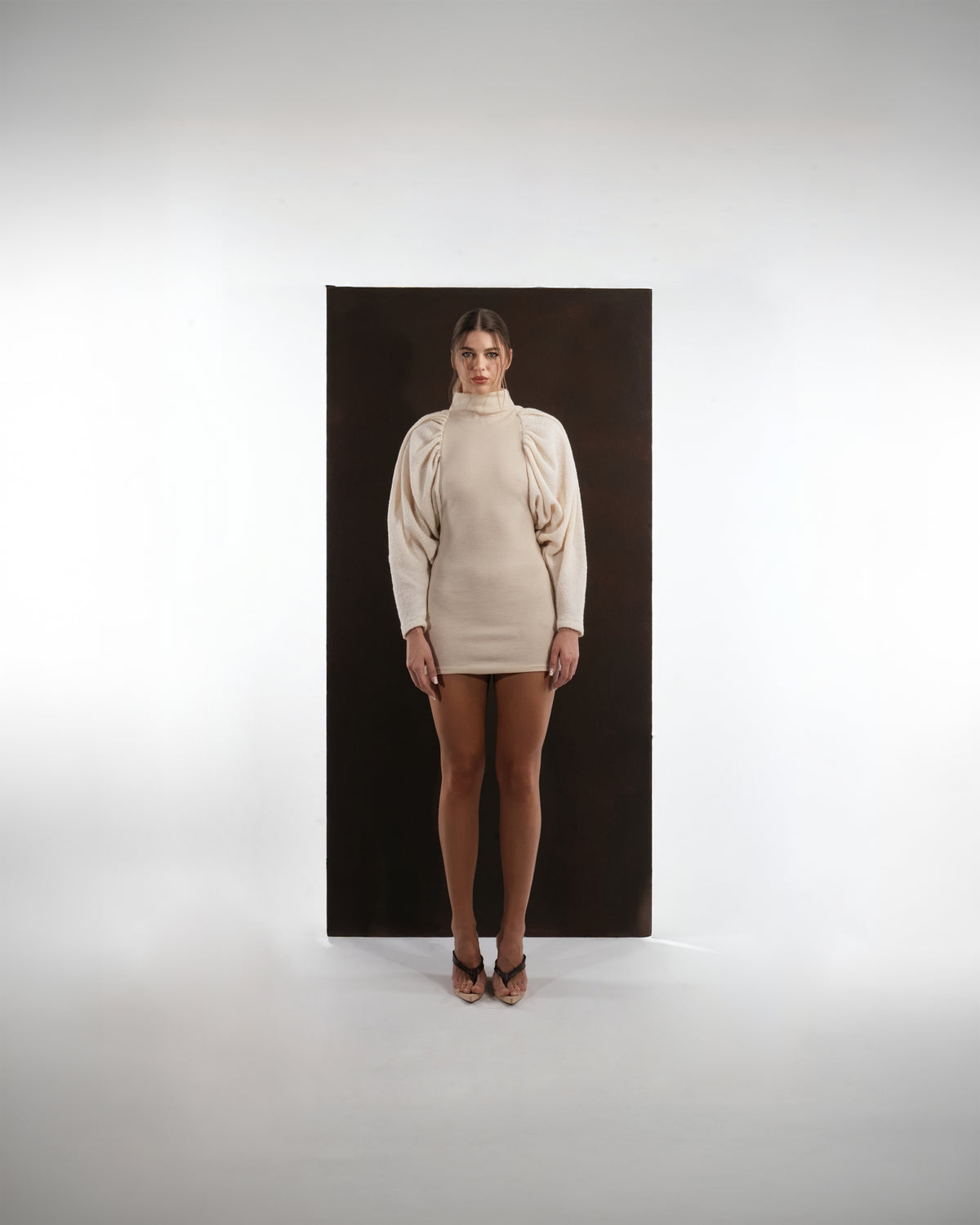 ALISADUDAJ ivory wool draped mini dress, front view, full length, showing high neck and gathered puff sleeves